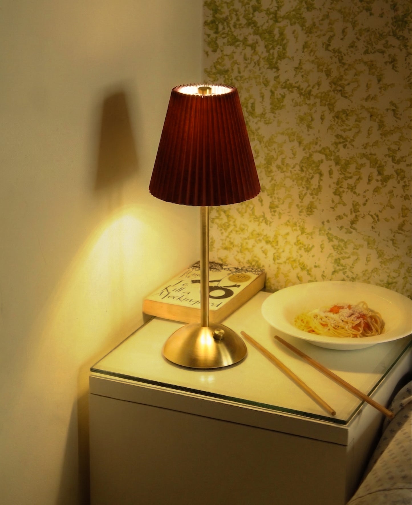 The Gazing Velvet Kasa cordless lamp placed on a wooden nightstand for aesthetic home decor.
