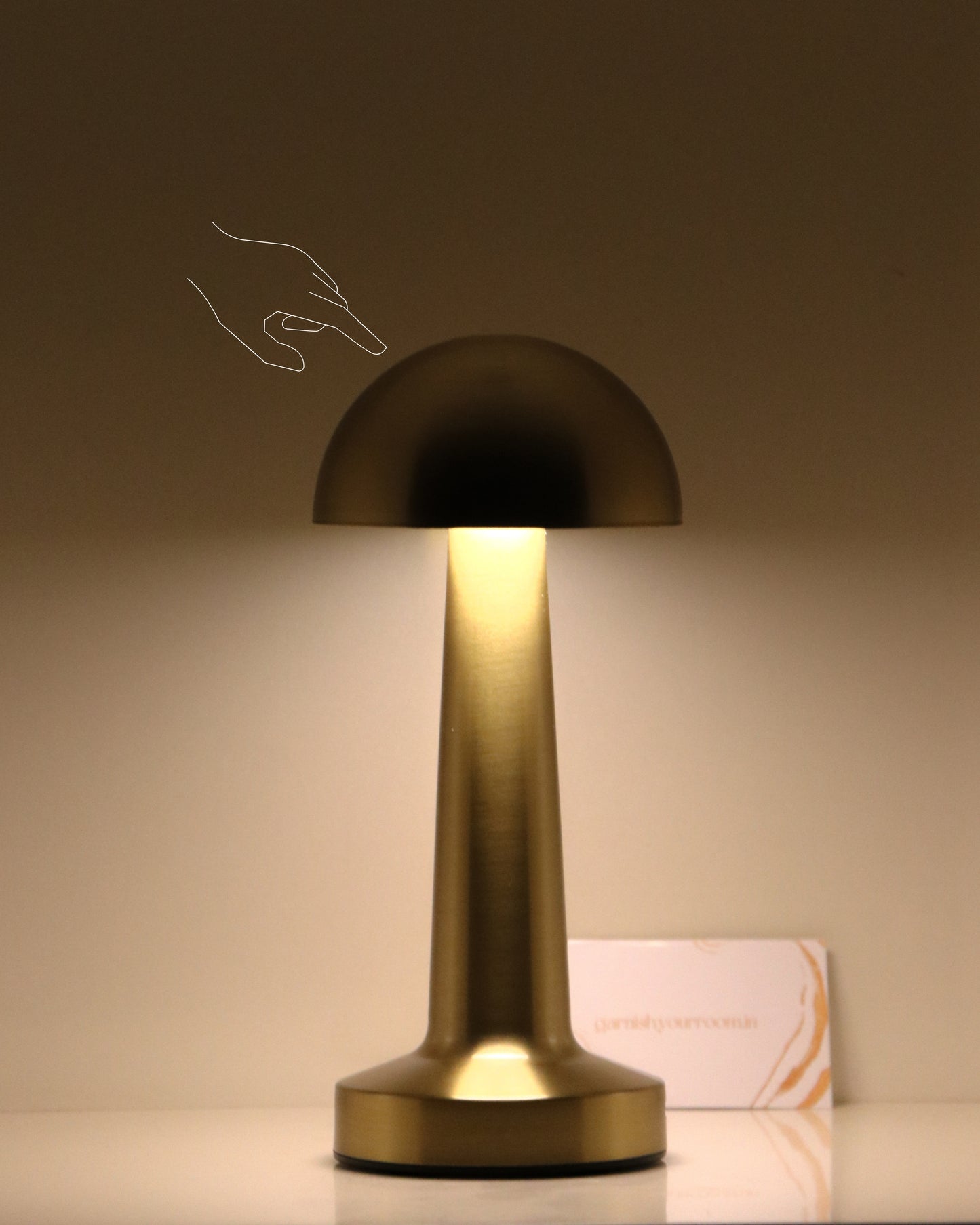 The Button Mushroom lamp lighting a cozy reading nook without messy wires, Touch Sensor on the head of the lamp.