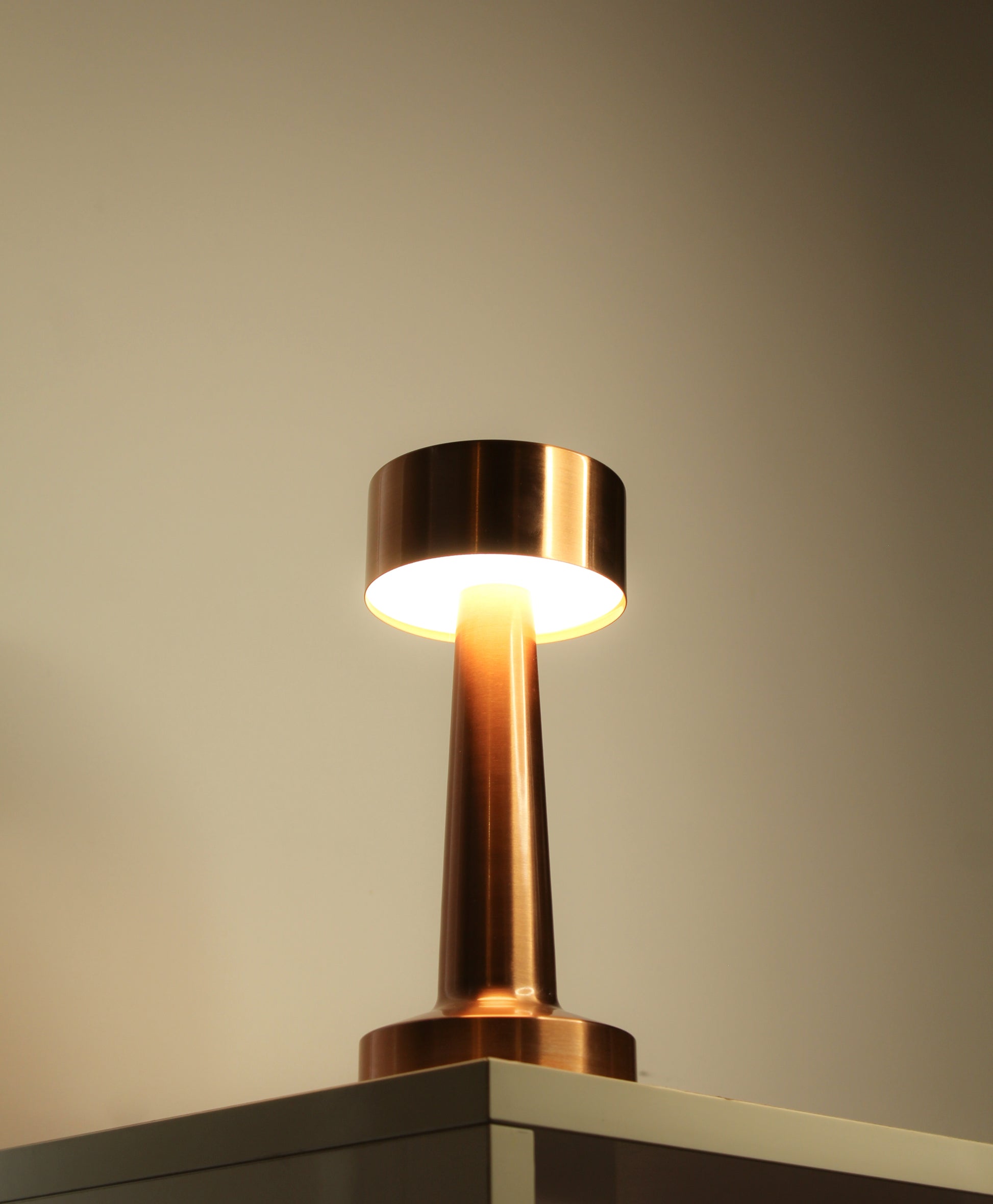 Retro Dune Descent Metal Lamp - Retro Dune Descent by Garnish, a mid-century modern cordless lamp with a sleek wide dome shade and gold base.