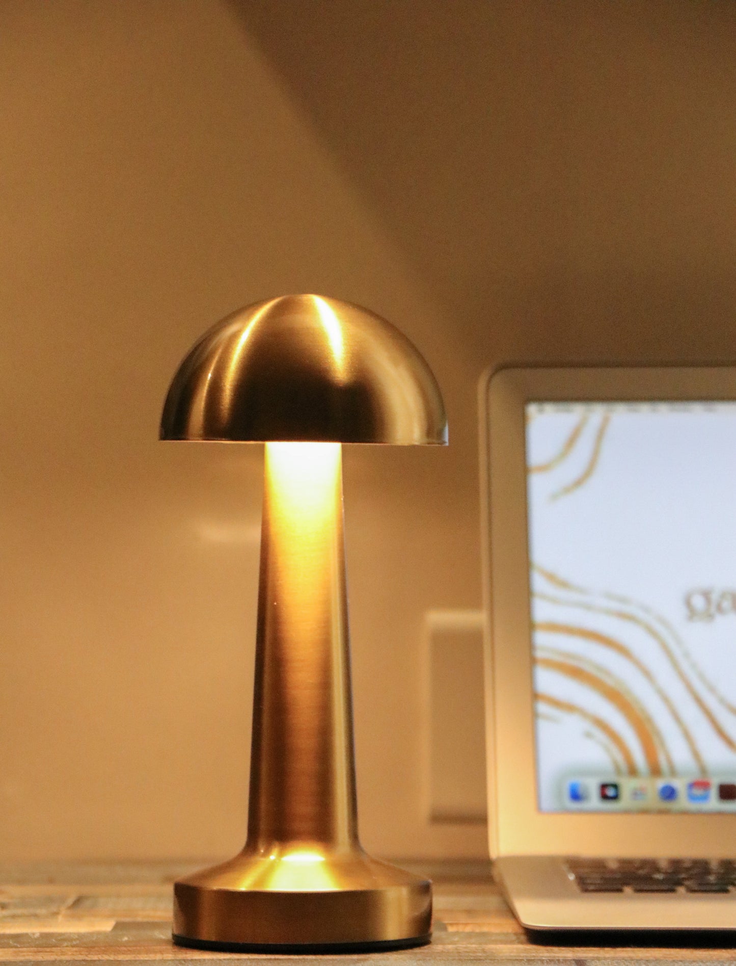 Button Mushroom Metal Lamp - Button Mushroom portable metal lamp with touch dimming, finished in champagne gold.