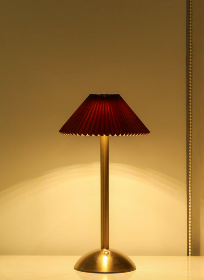Clean side view of the Velvet Kasa lamp highlighting its seamless metal construction.