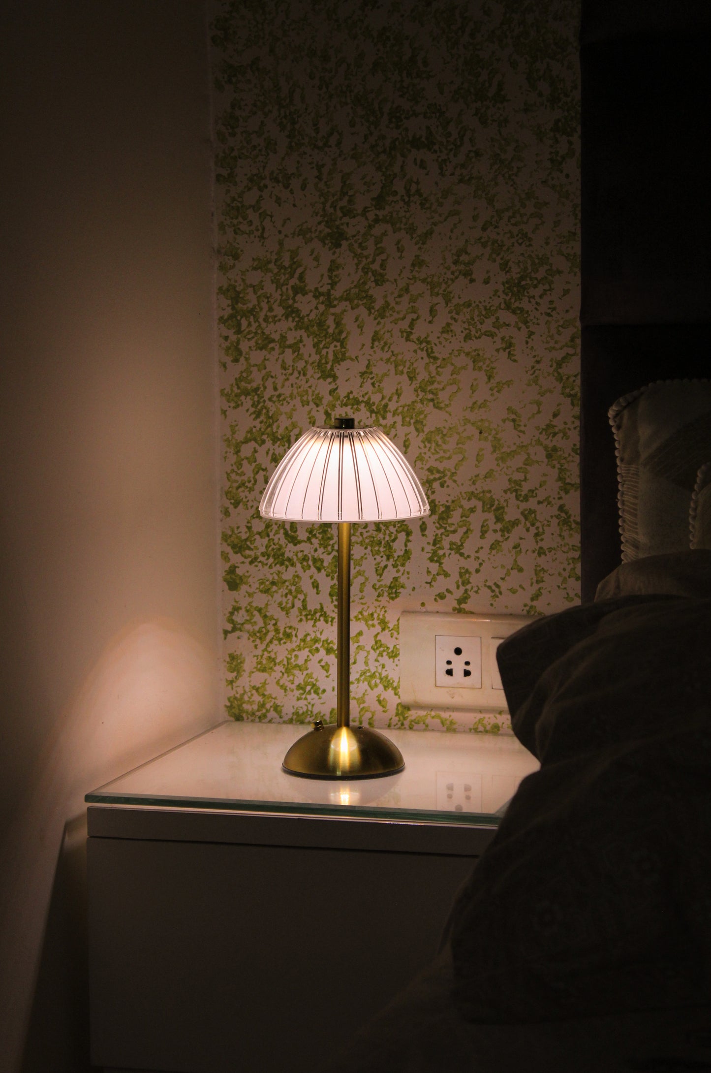 Aura Ember by Garnish, a luxury champagne brass cordless lamp providing a Comfortable Numb light.