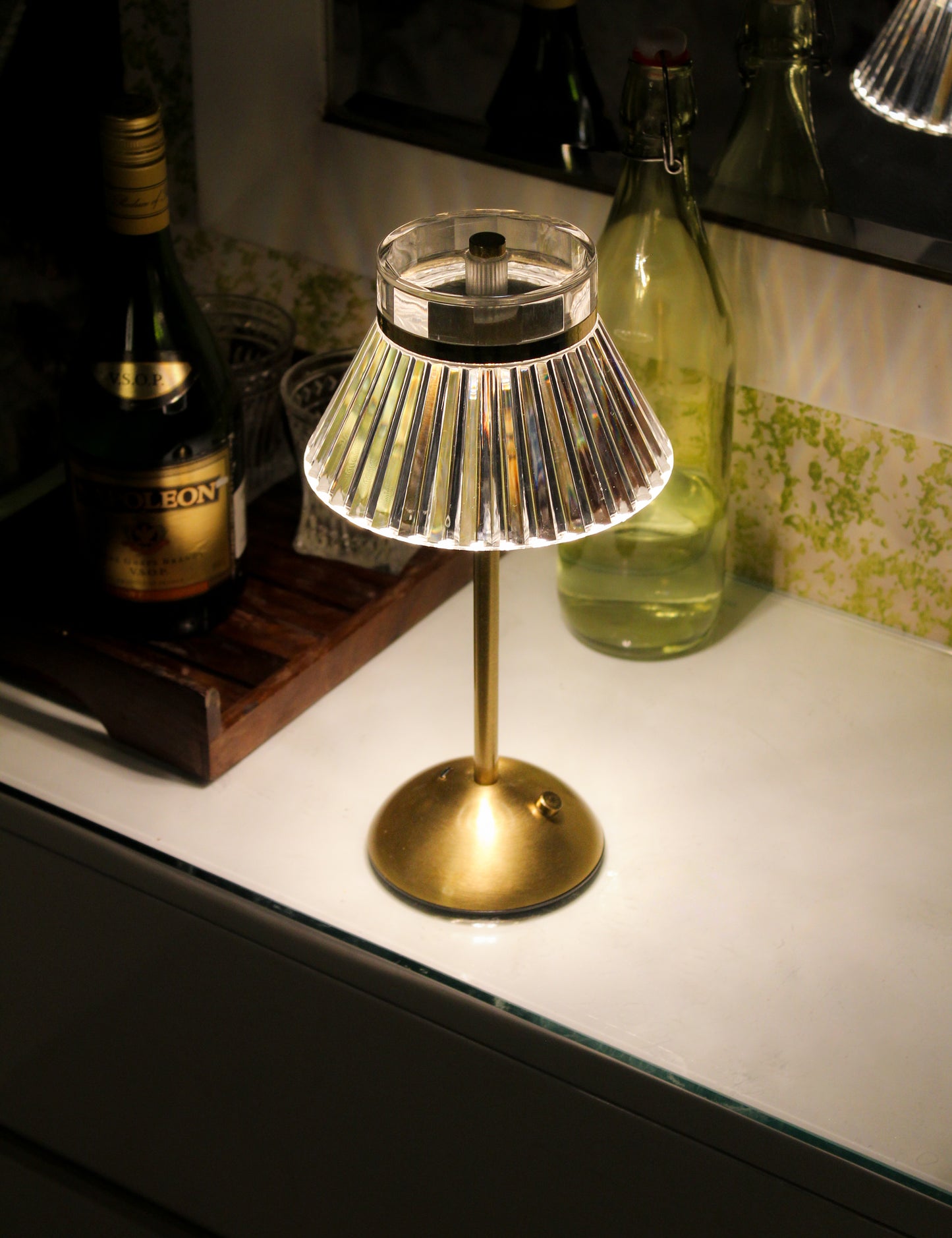 Lucid Luxe metal touch lamp, a cordless sculptural light piece for modern minimalist interiors.