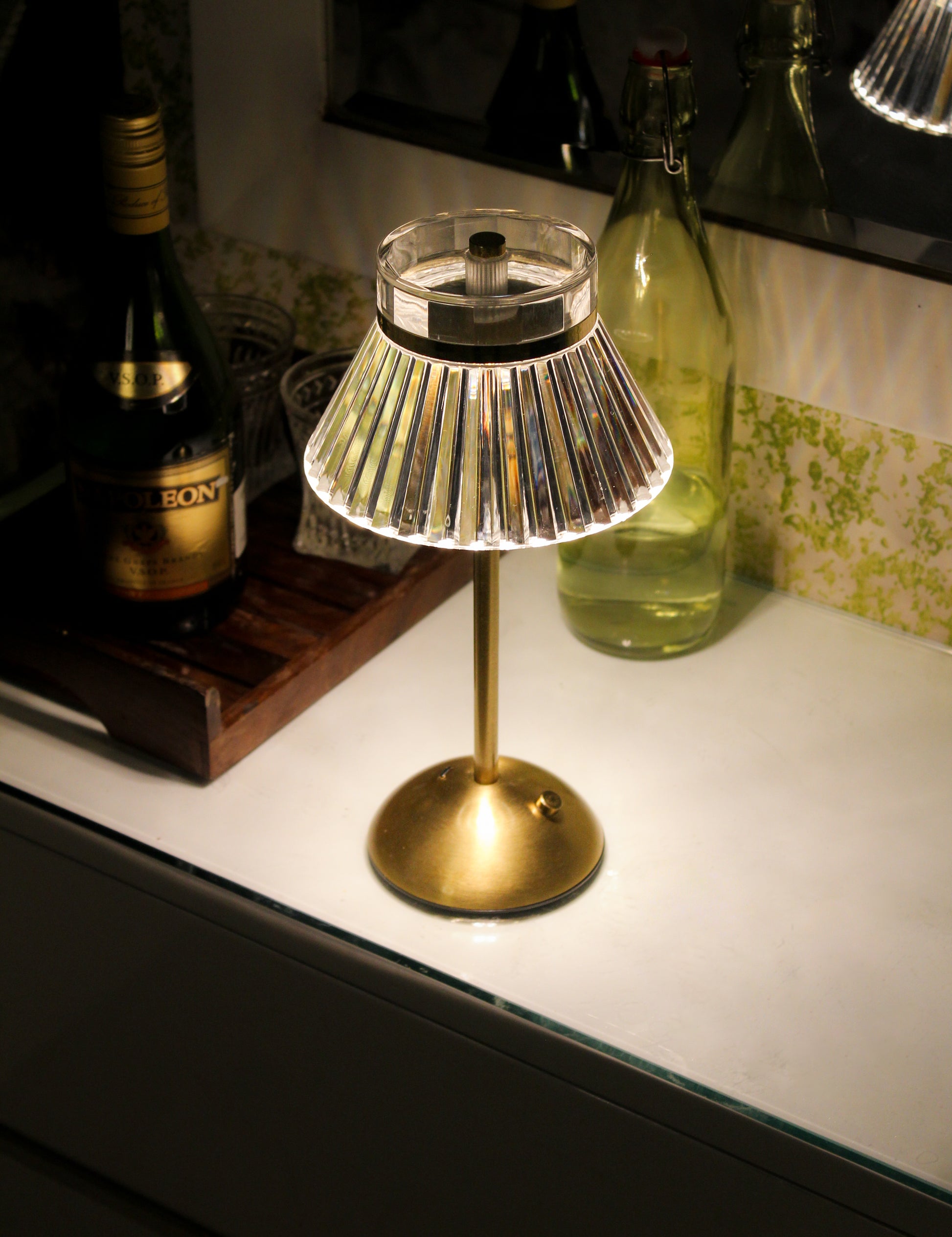 Lucid Luxe metal touch lamp, a cordless sculptural light piece for modern minimalist interiors.