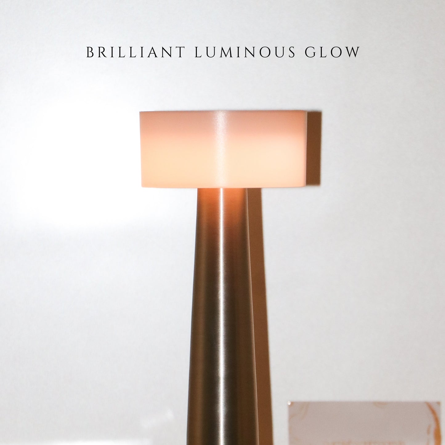 The Retro Dune lamp used as a bedside lamp in a luxury suite setting - Brilliant Luminous Glow.