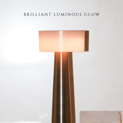 The Retro Dune lamp used as a bedside lamp in a luxury suite setting - Brilliant Luminous Glow.